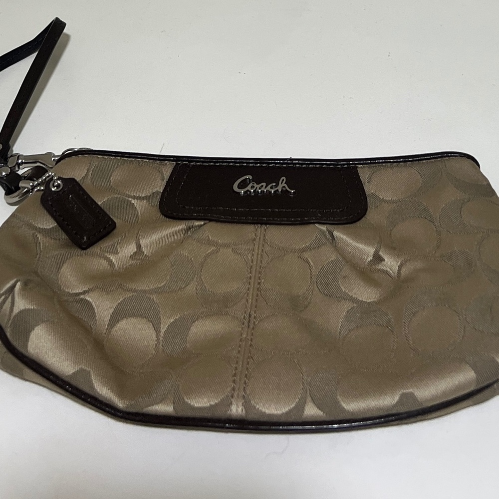 Large signature coach wristlet